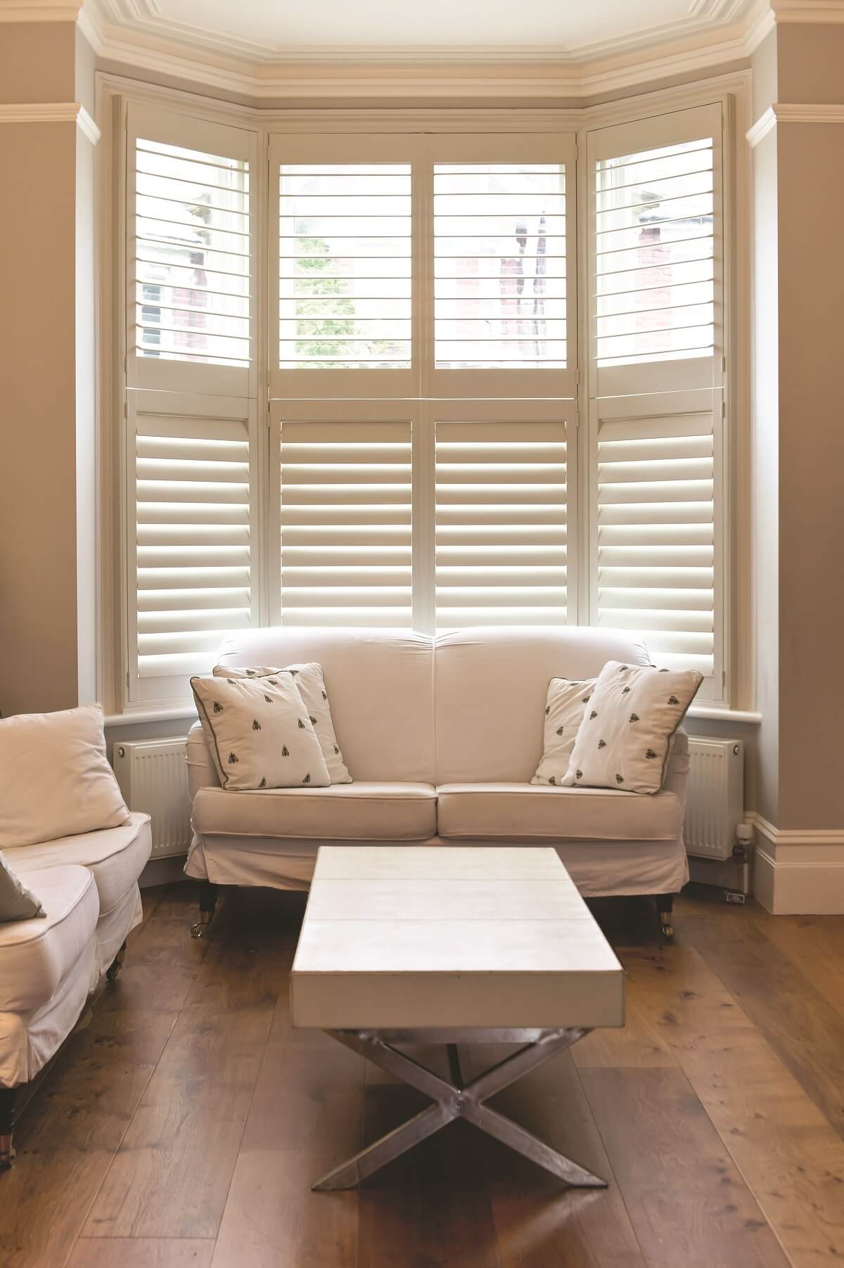 beautiful living room with blinds on windows