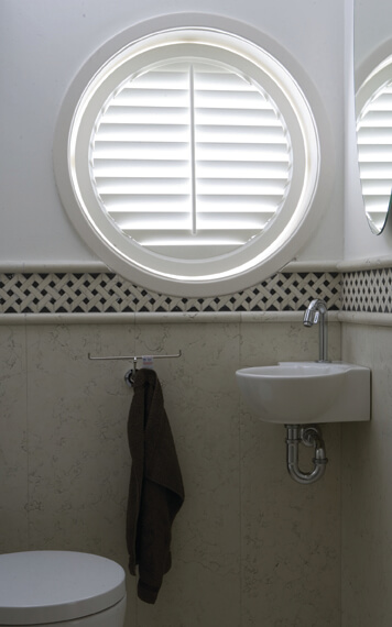 beautiful bathroom with blind on window